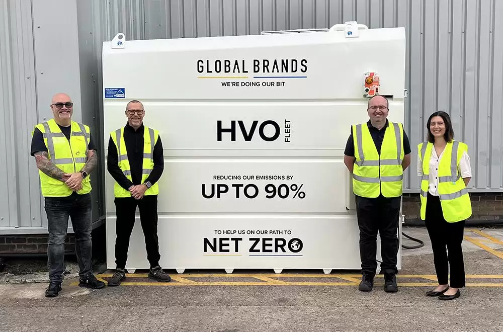 Global brands staff pictured with HVO tank